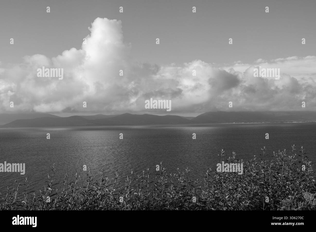 Cloudy sky few clouds in Black and White Stock Photos & Images - Alamy