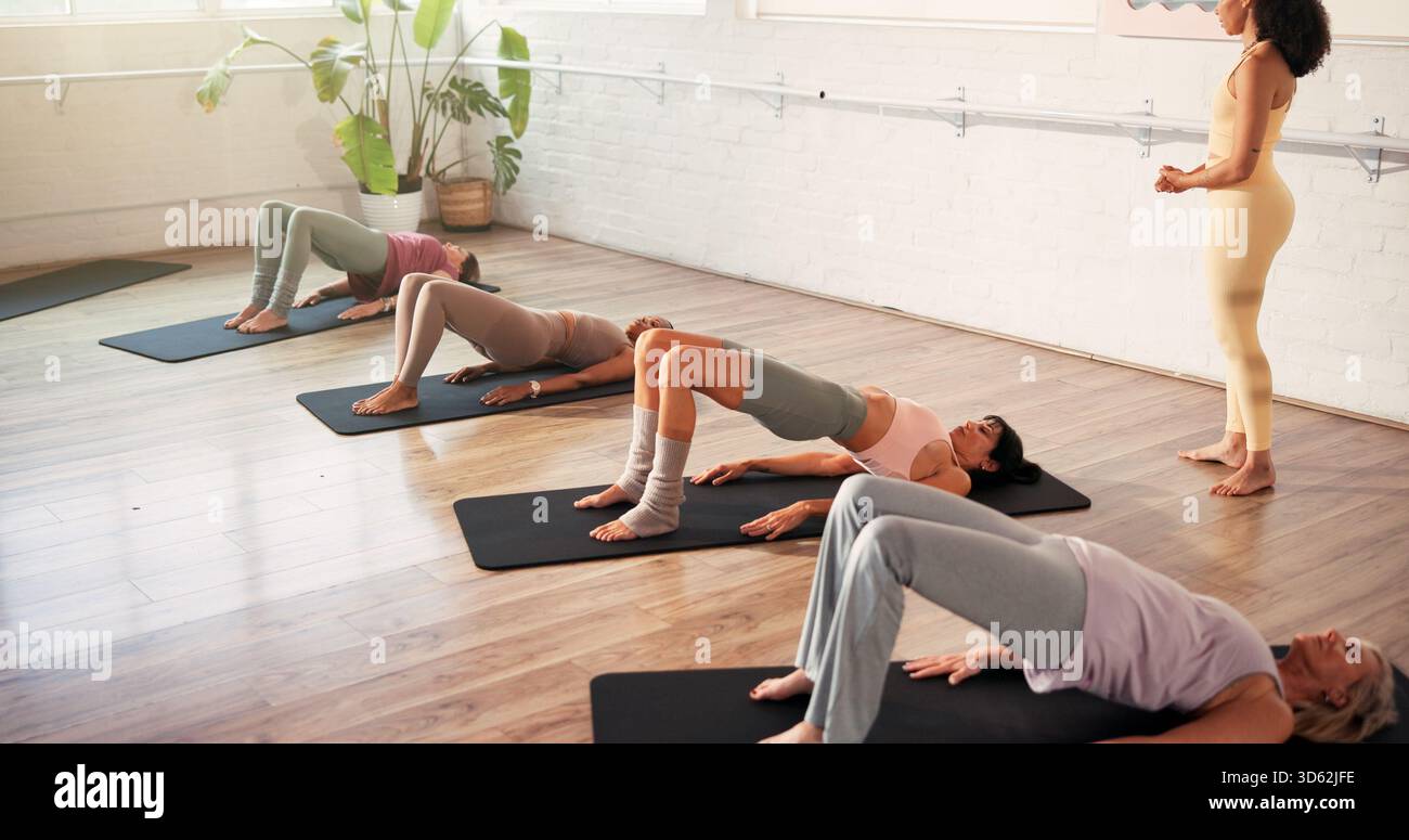 Woman, glute bridge and exercise with group, coach and balance with ...