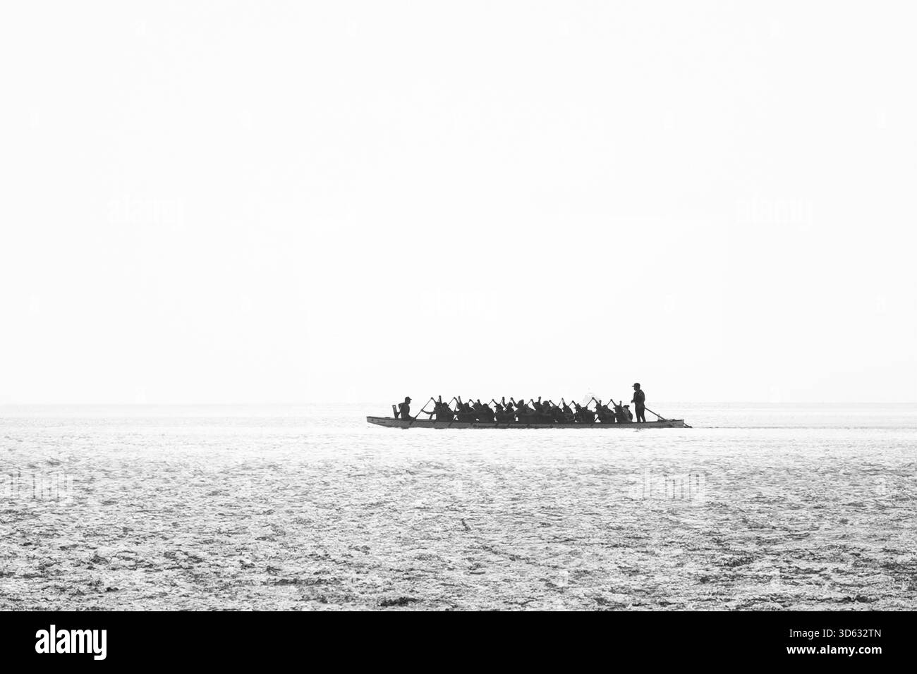 Doha, Qatar - October 24, 2025: Silhouette people rowing dragon boat at ...