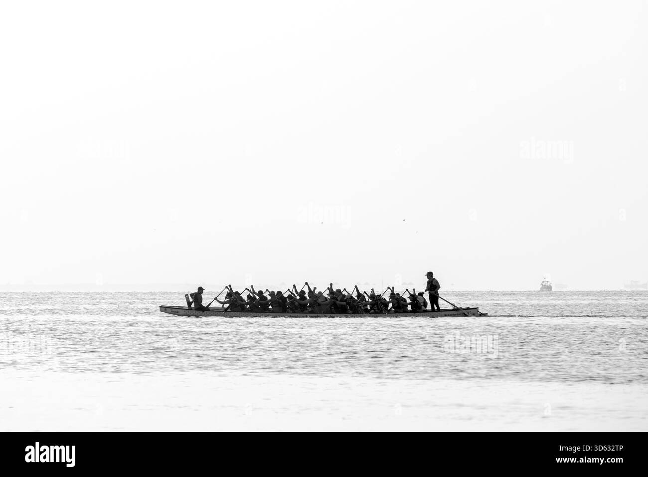 Doha, Qatar - October 24, 2025: Silhouette people rowing dragon boat at ...