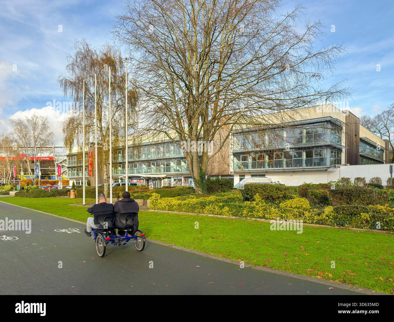 Sport Wales National Centre in Cardiff framed by vibrant autumn foliage on a bright November day in Bute Park, South Wales: Phillip Roberts - Smartphone Captured Stock Image