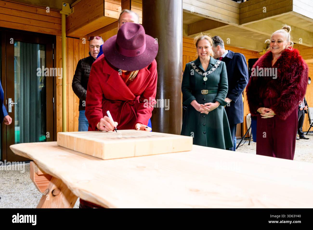 Queen Maxima at the opening of the circular wooden residential building ...