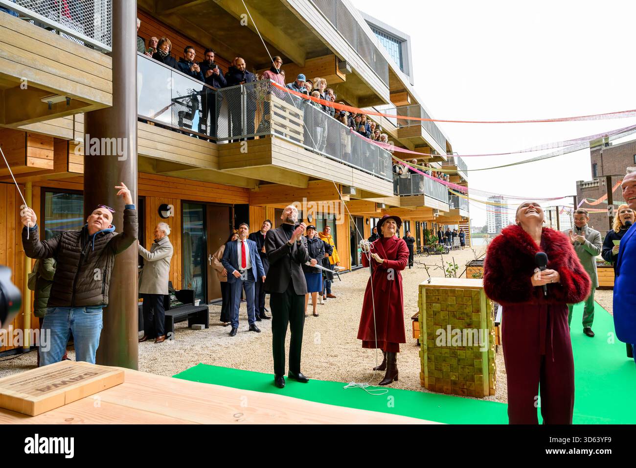 Queen Maxima at the opening of the circular wooden residential building ...