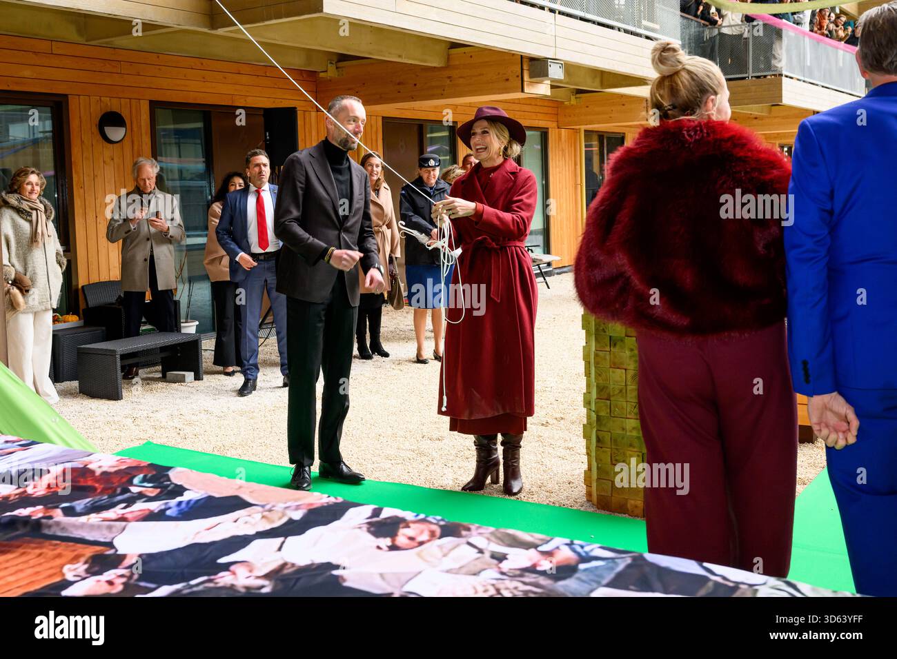 Queen Maxima at the opening of the circular wooden residential building ...