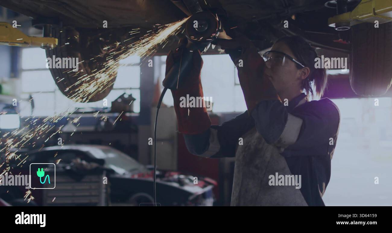 Grinding woman tech wearing PPE using grinder under lifted car on hydraulic lift sparks, copy space Stock Photo