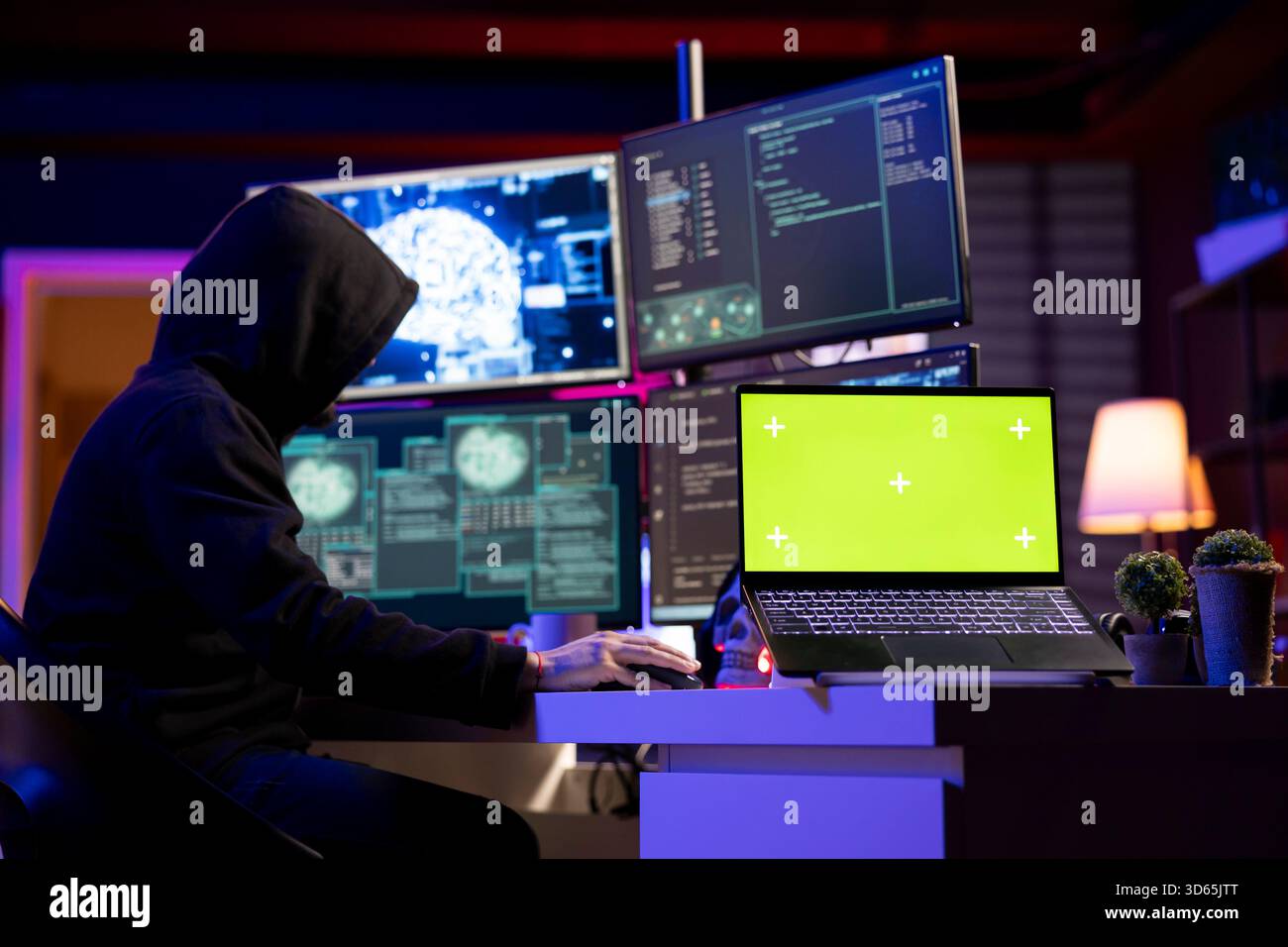 Hacker using isolated screen laptop to extract military secrets data from secure digital systems. Cybercriminal using mockup notebook device in hidden base, running espionage software Stock Photo