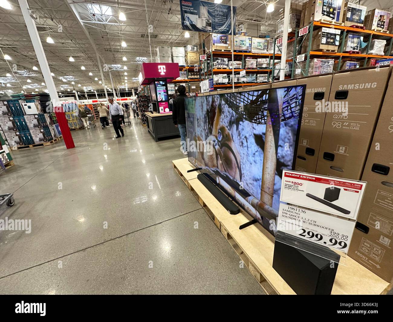 A 98-inch television stands on display for shoppers in a Costco ...