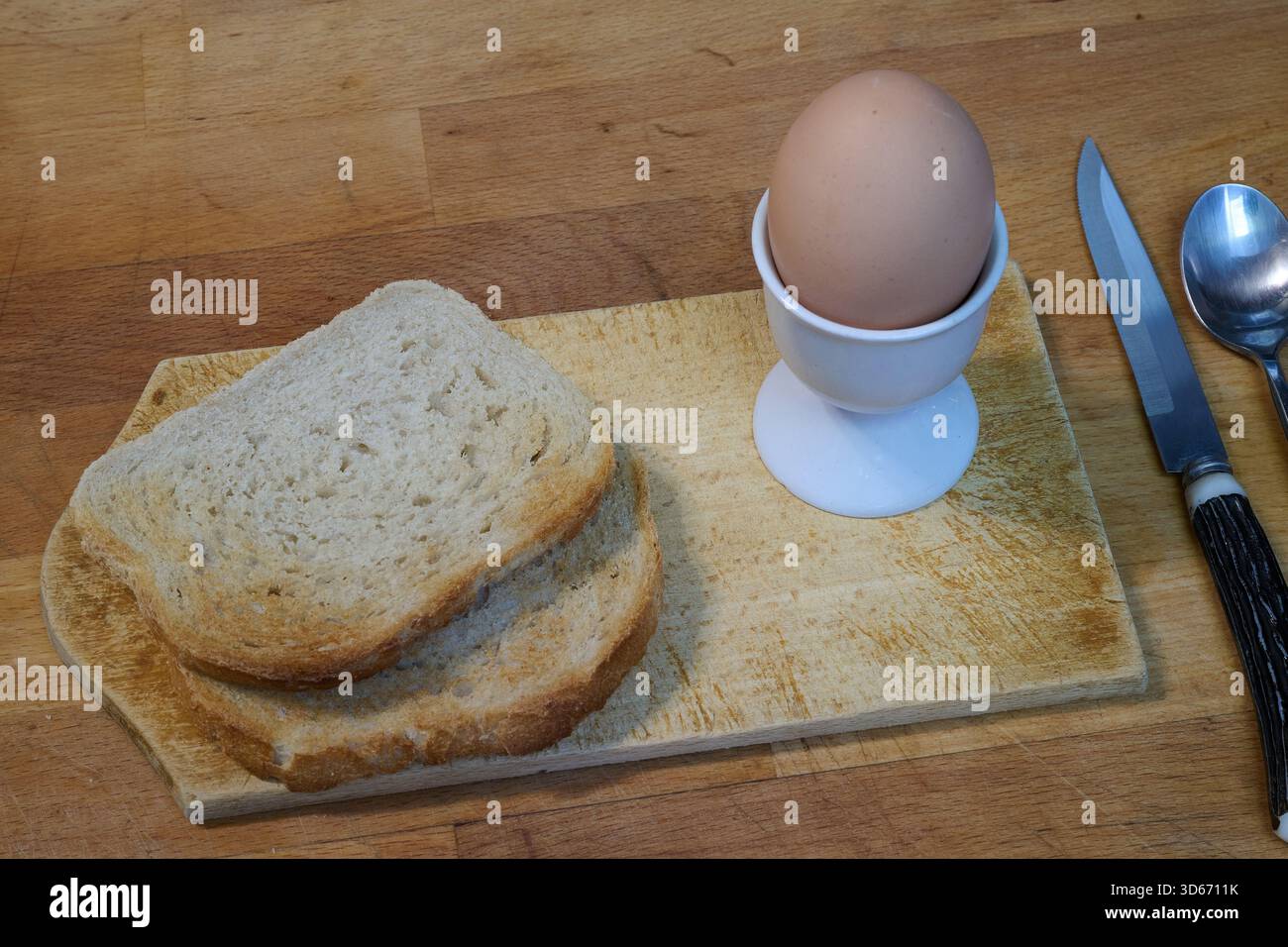soft-boiled egg and toast from above Stock Photo