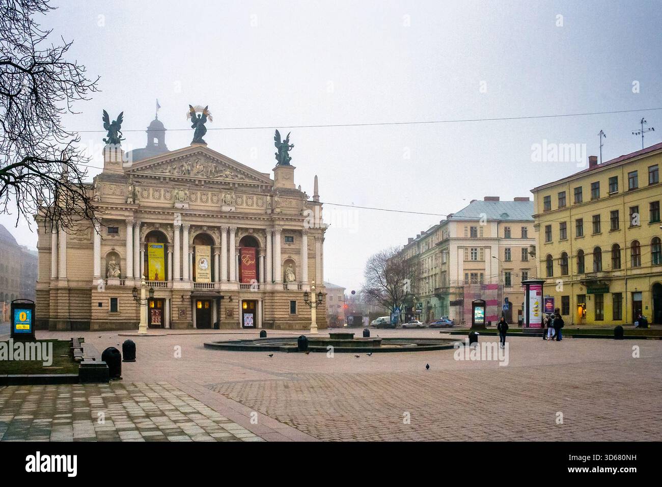 lviv, ukraine - 17 nov 2012: opera house on freedom avenue on a misty autumn morning. state academic theater of opera and ballet is unesco heritage in Stock Photo