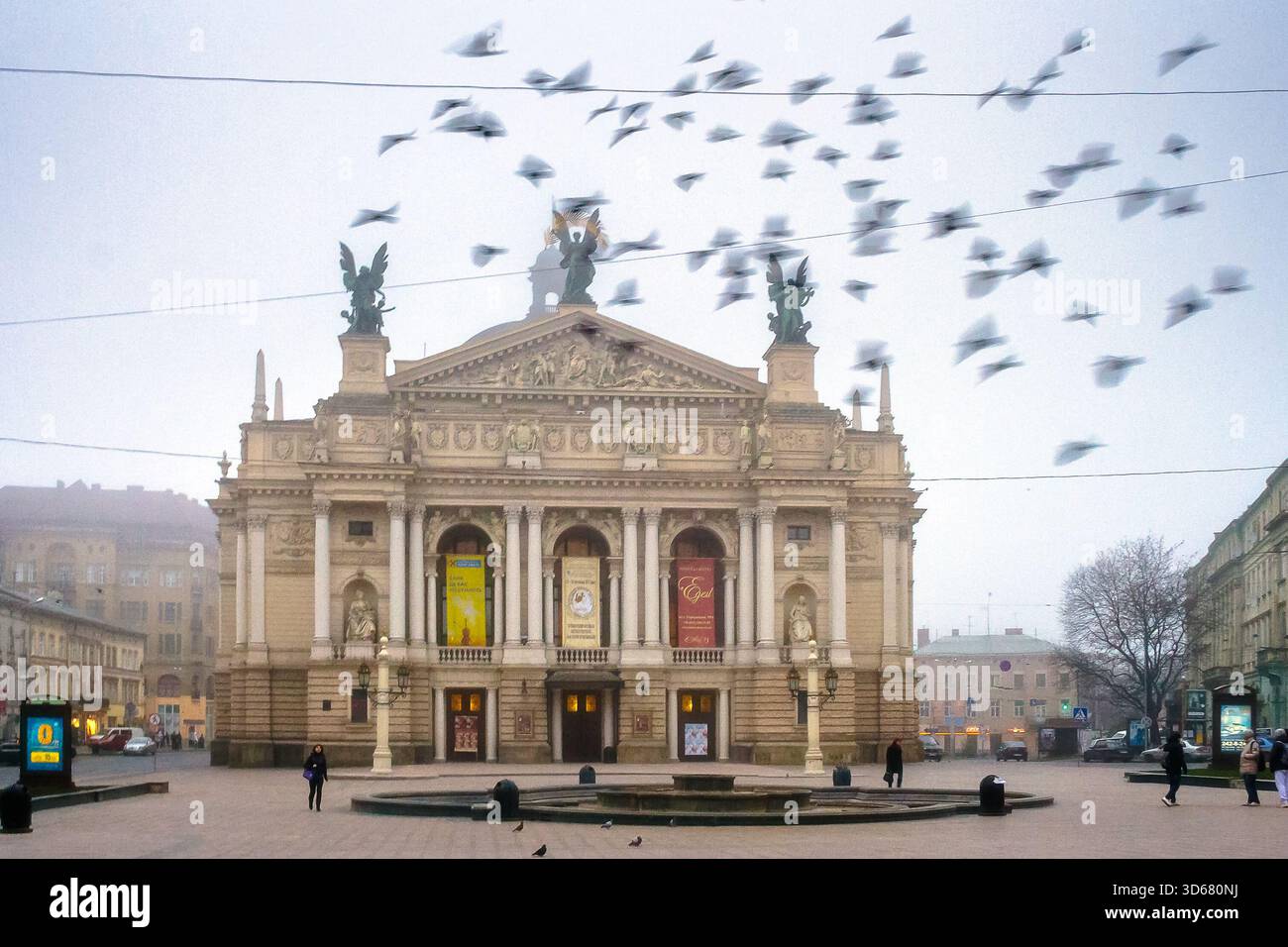 lviv, ukraine - 17 nov 2012: opera house on freedom avenue on a misty autumn morning. state academic theater of opera and ballet is unesco heritage in Stock Photo