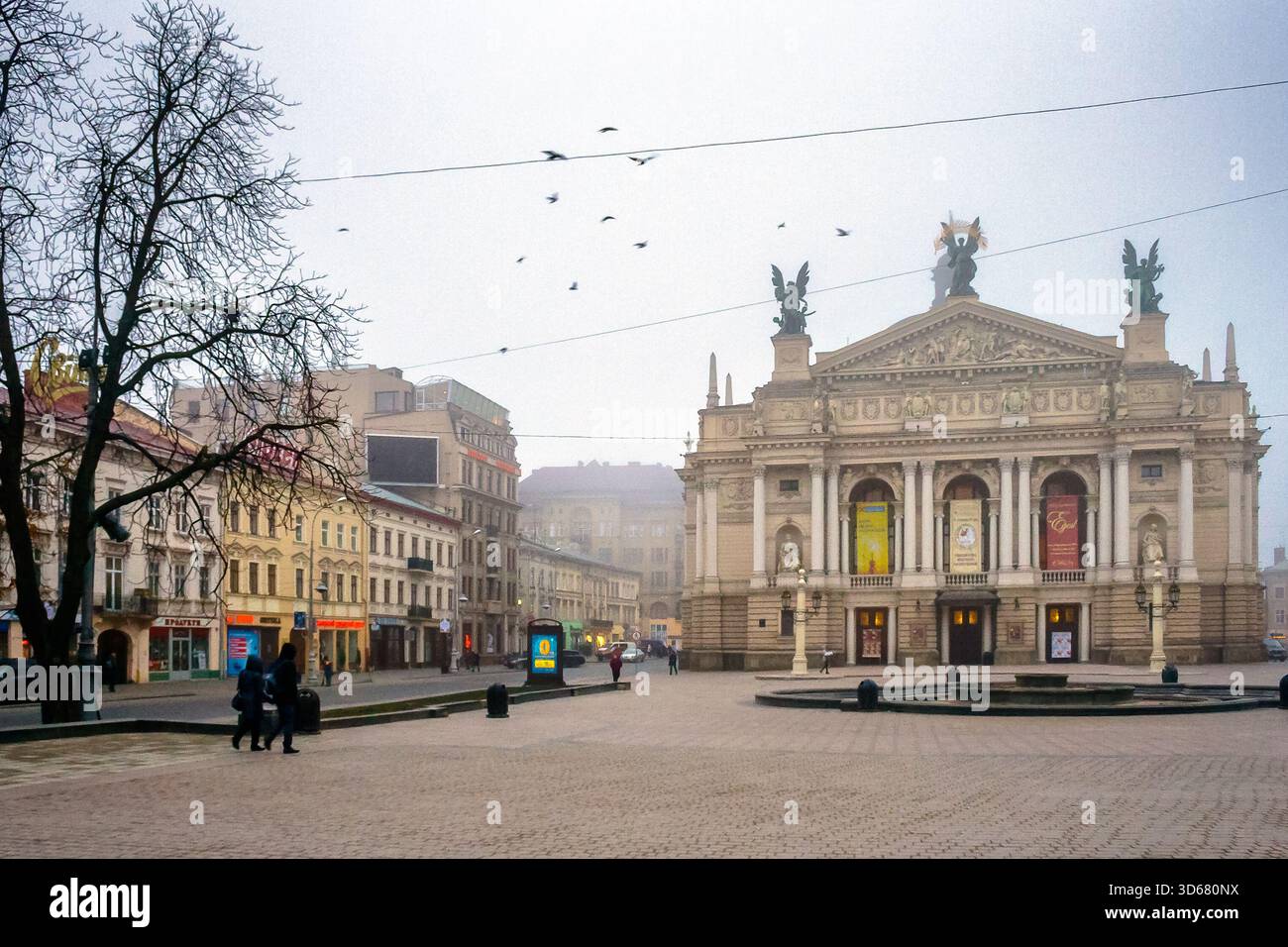 lviv, ukraine - 17 nov 2012: opera house on freedom avenue on a misty autumn morning. state academic theater of opera and ballet is unesco heritage in Stock Photo