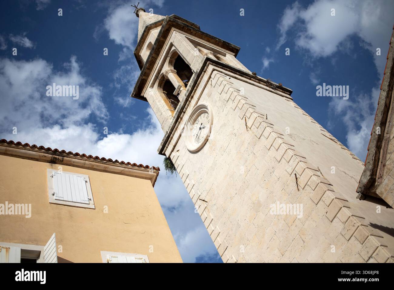 Bell tower and clock of the Church of Saint John the Baptist in Budva ...