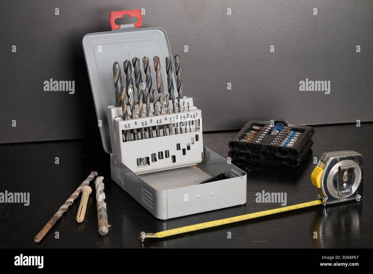 drill bit box view from above against white wall Stock Photo