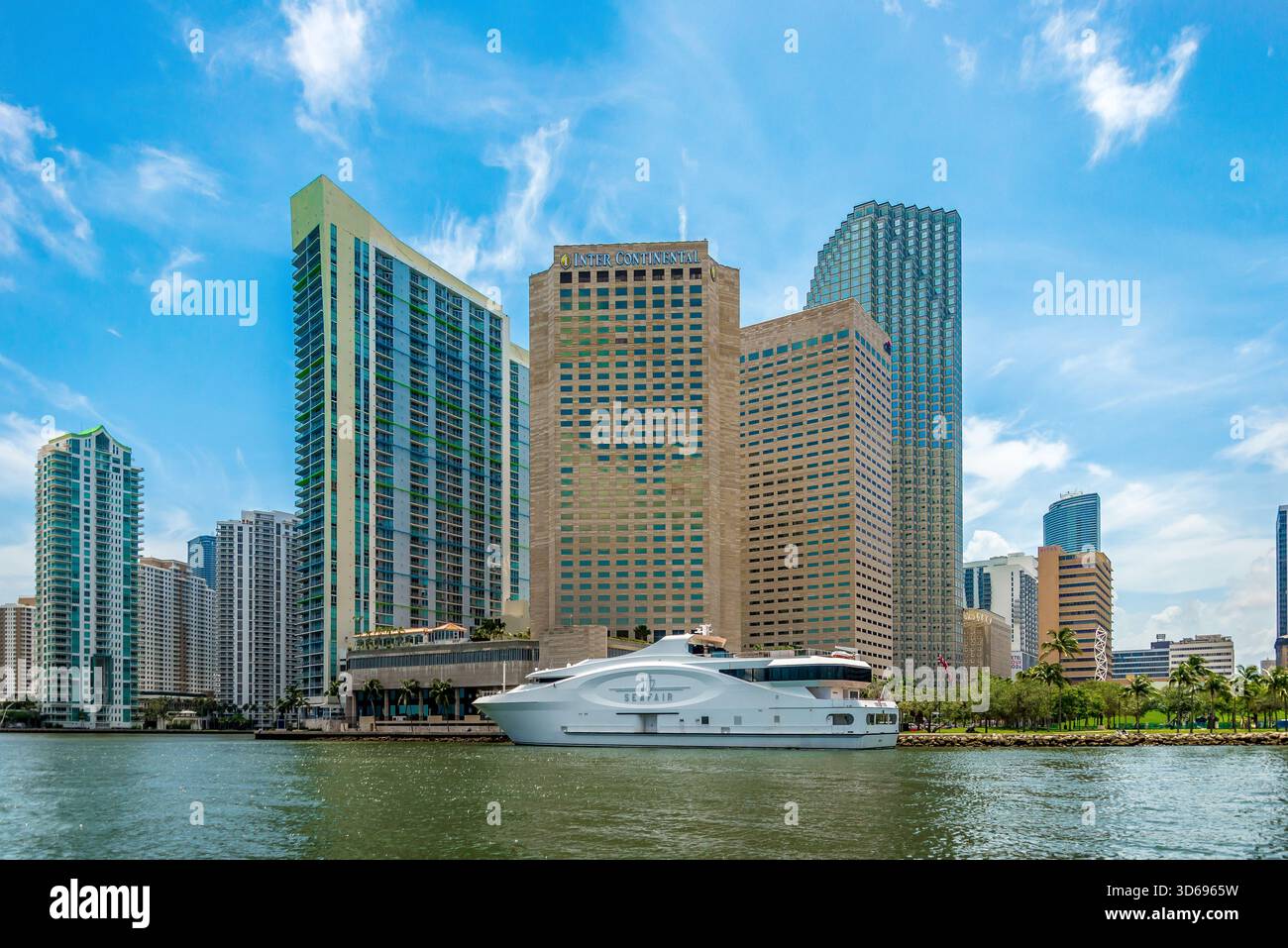 Fresh Look at Waterfront Condos With Luxury Yacht Stock Photo