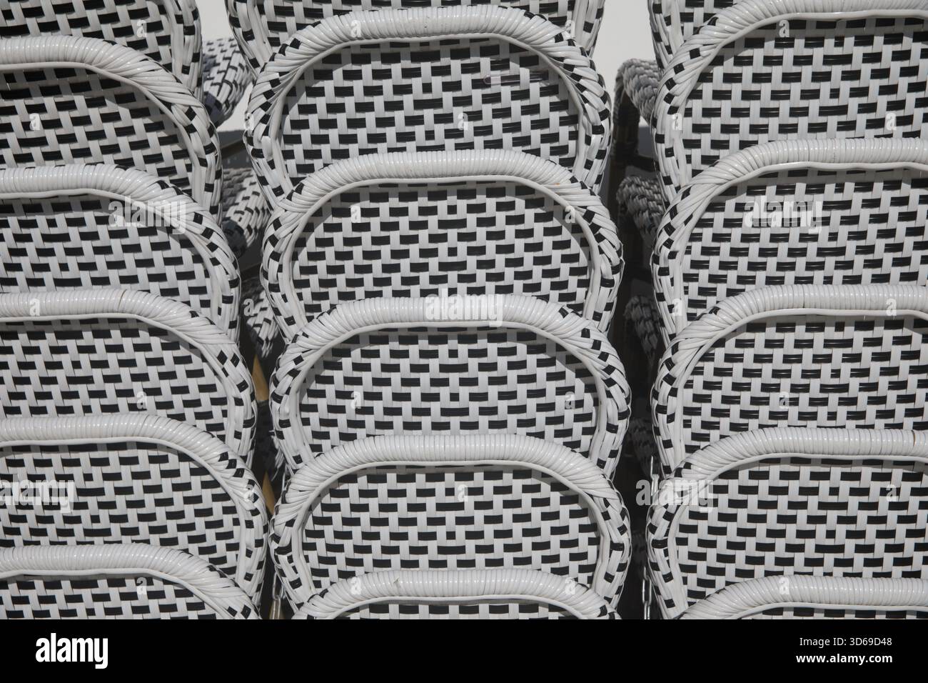 France, Normandy region, Calvados department, Côte Fleurie (Flowery Coast), Deauville, rue du Casino, stacked chairs, Stock Photo