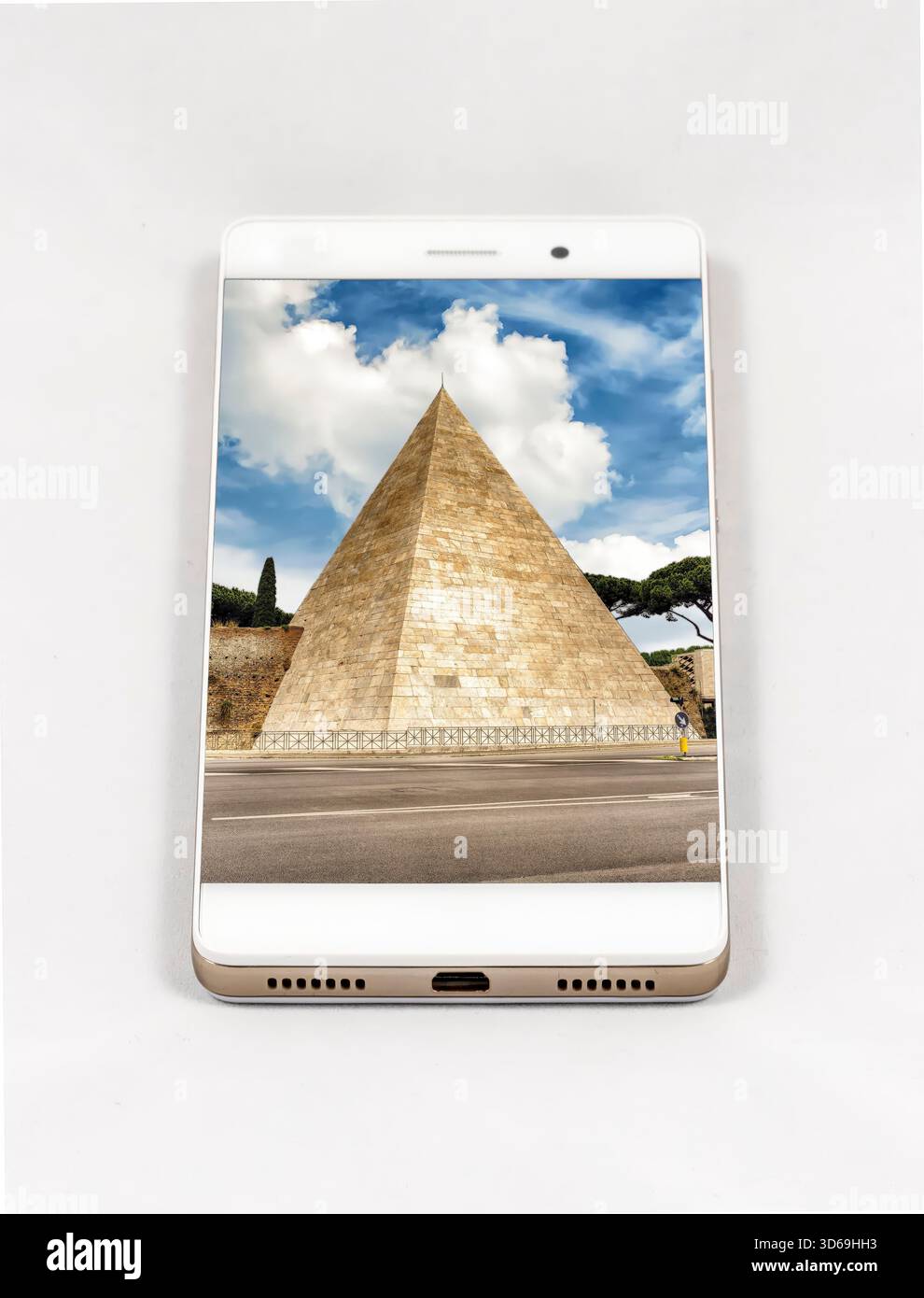 A white and gold smartphone showcases the ancient Pyramid of Cestius ...