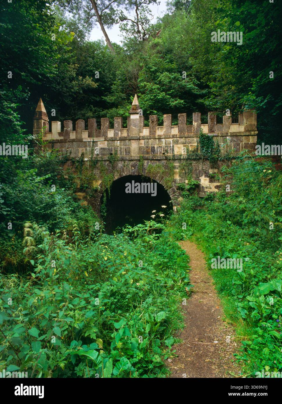 Daneway Walk View SE of the C18th Gothic, castellated facade of the Daneway Portal ...