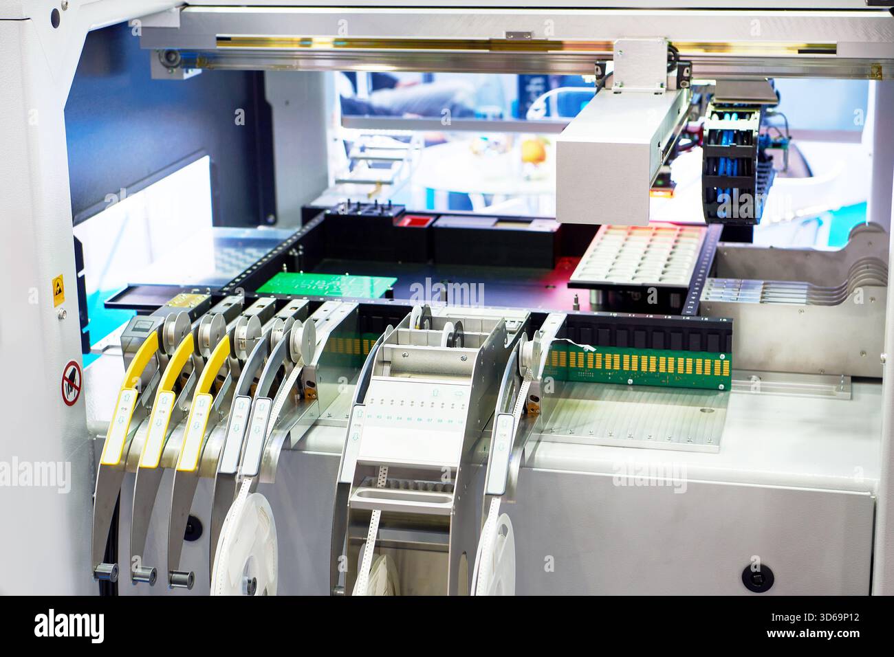 Modern automatic electronic component insertion machine Stock Photo
