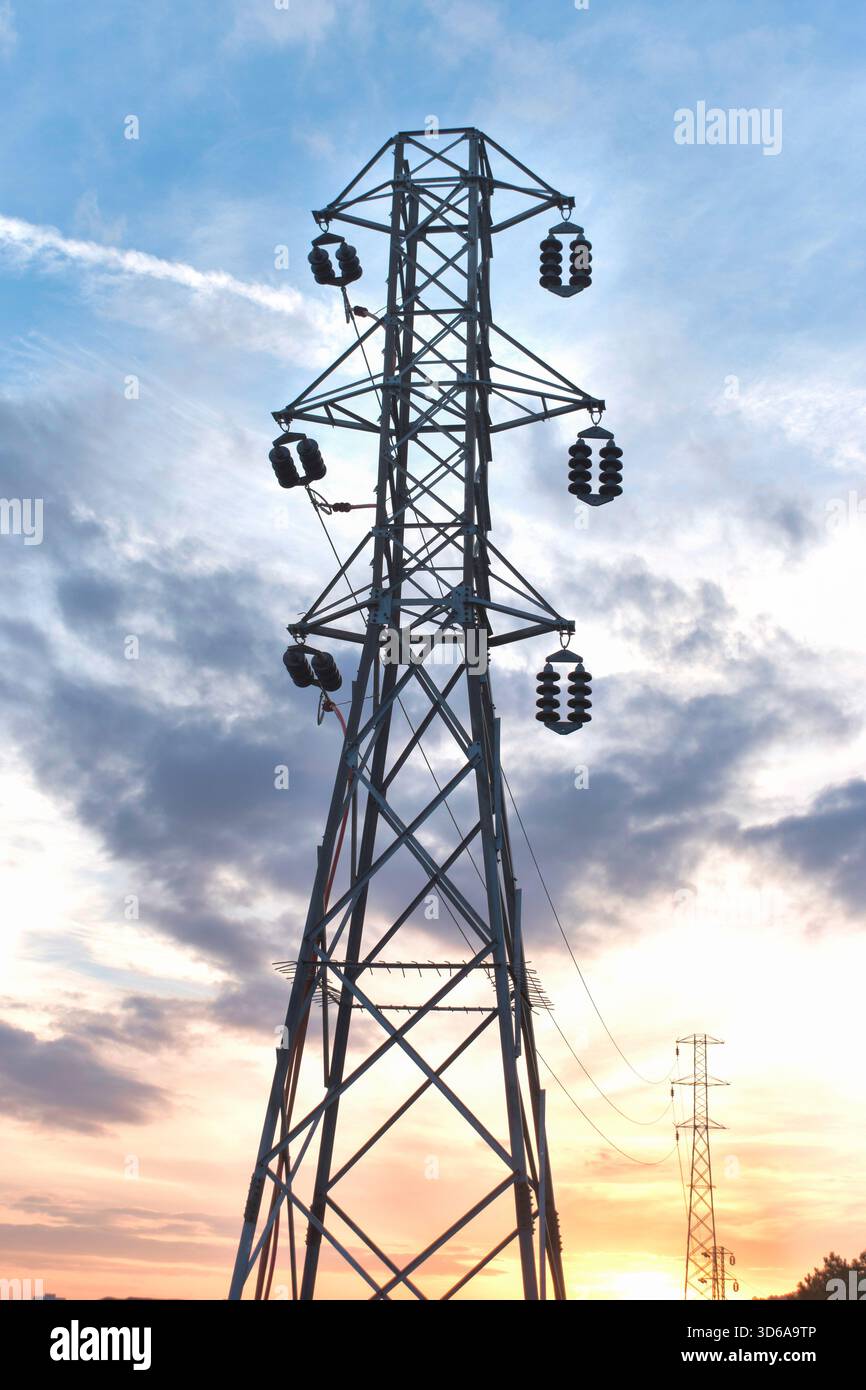 Tall steel electricity pylon with high-voltage power lines Stock Photo ...