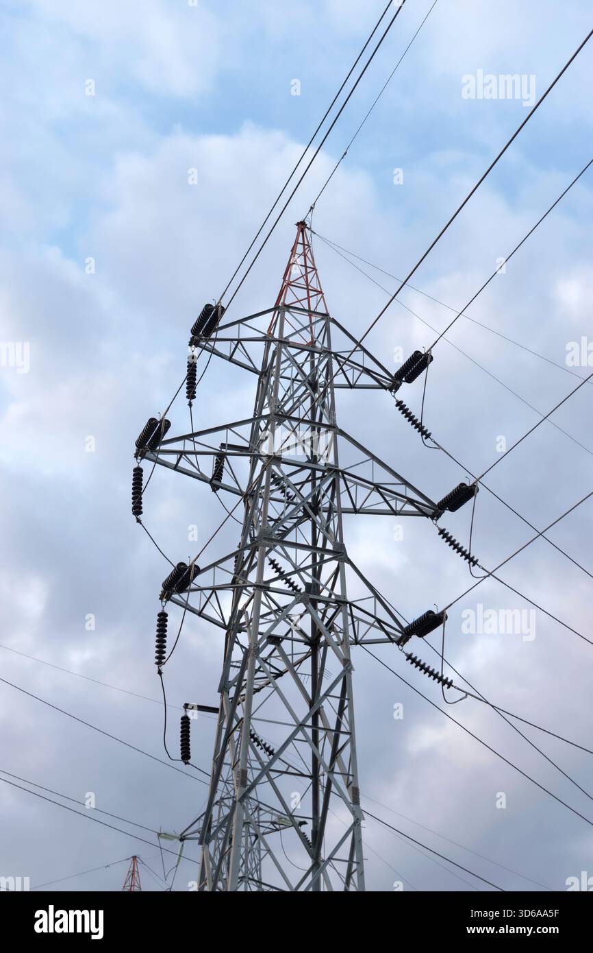 Power transmission pylons and high-voltage lines against blue sky Stock ...