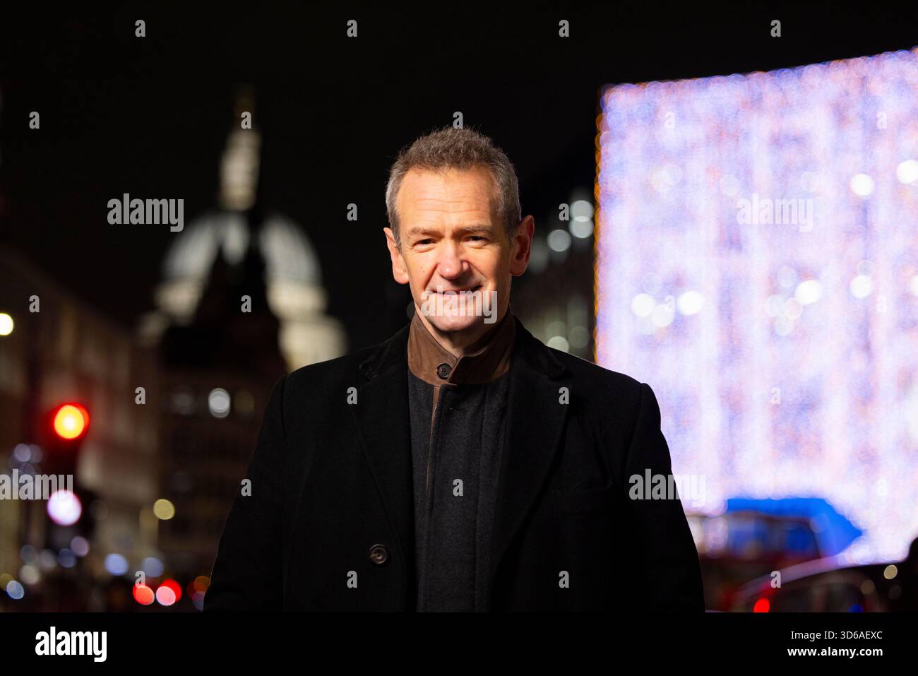 EDITORIAL USE ONLY Alexander Armstrong kick starts the Christmas celebrations in Fleet Street Quarter, marking the launch of the area's partnership with the National Literacy Trust and debut of it's 'Snoopy in the City' Sculpture Trail as part of Peanuts' 75th anniversary, London. Issue date: Wednesday 19 November, 2025. Stock Photo