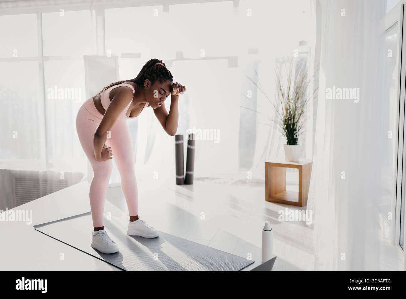 Tired woman gym training session hi-res stock photography and images ...