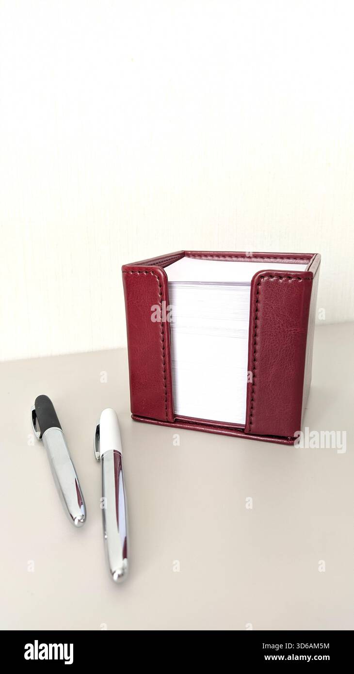 Office desk table with notebook and pencil Top view copy space. paper for notes sticky notes Stock Photo