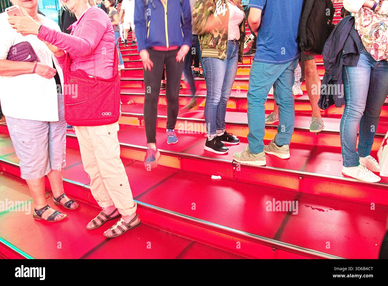 Iconic red stairs at New York's Times Square at night, New York City ...