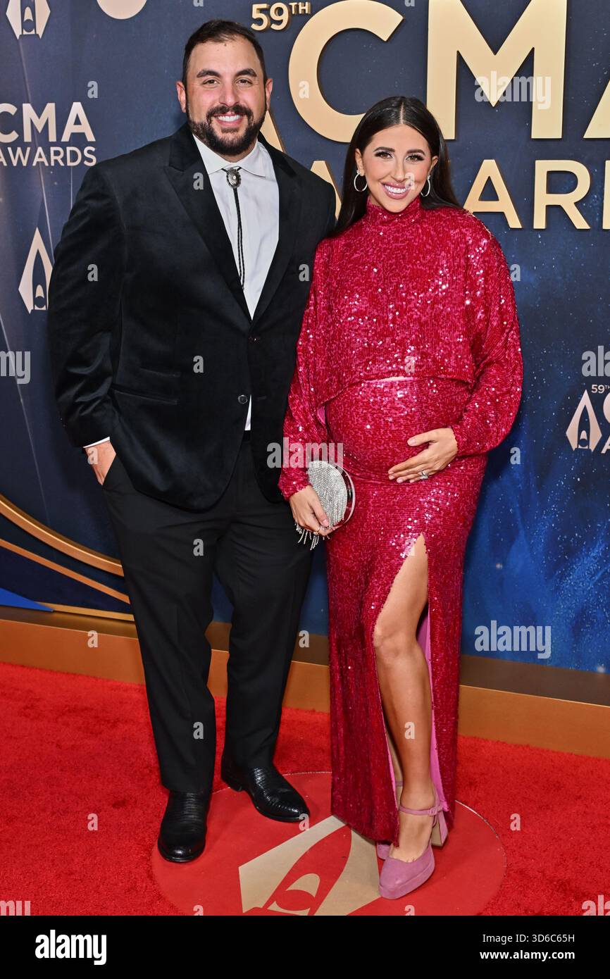 Ted Raad, left, and Dede Raad arrive at the 59th Annual Country Music Association Awards on ...