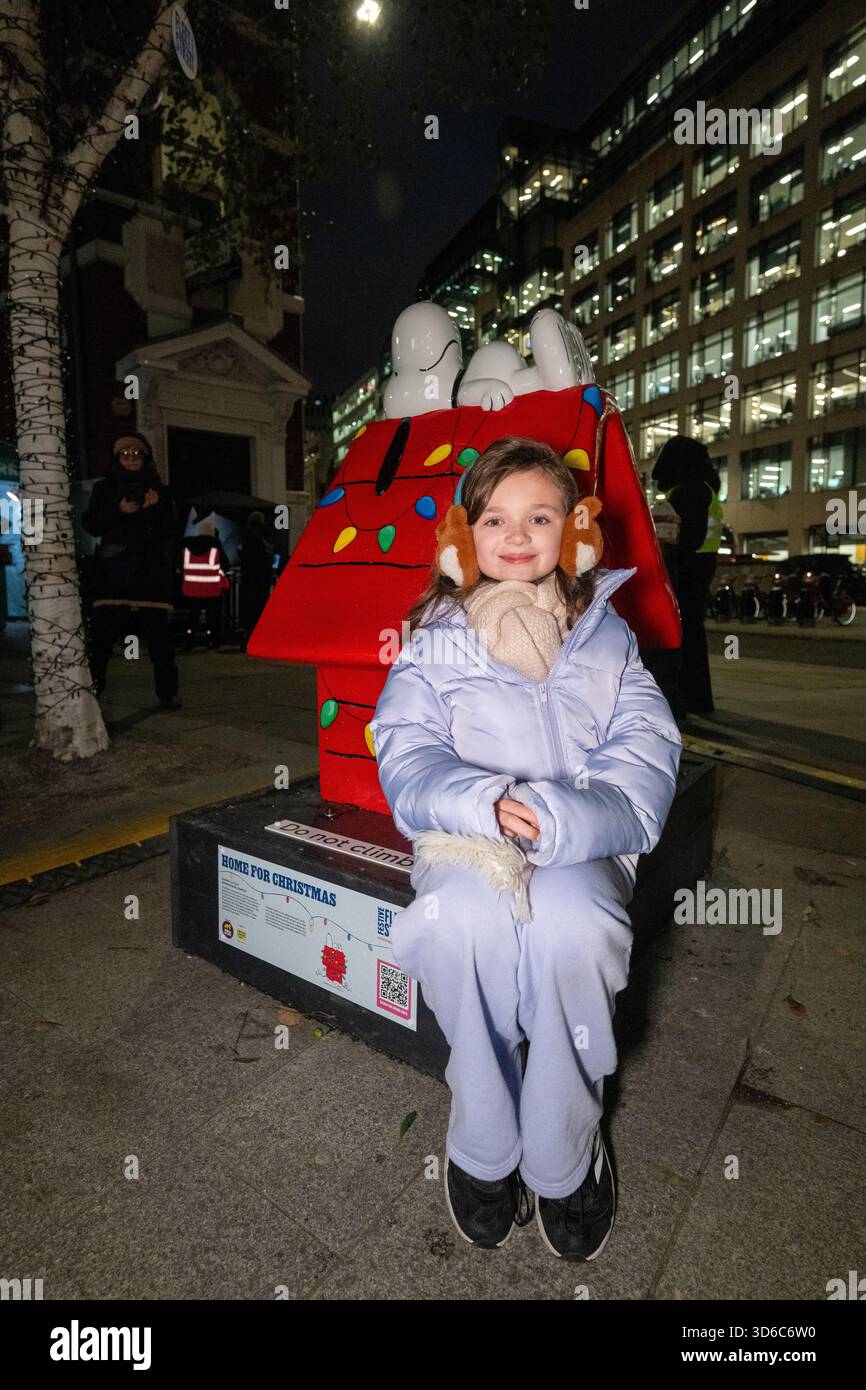 London, UK, 19th November 2025, Christmas Lights were switched on in Fleet Street by Alexander Armstrong, Snoopy and  Lady Lucy French on the 19th November. It marks the start of Festive Fleet Street Quarter 2025 programme which includes a Snoopy sculpture trail. Featuring 12 artist-designed Snoopy sculptures displayed across the Quarter, this runs until 16th January 2026., Andrew Lalchan Photography/Alamy Live News Stock Photo