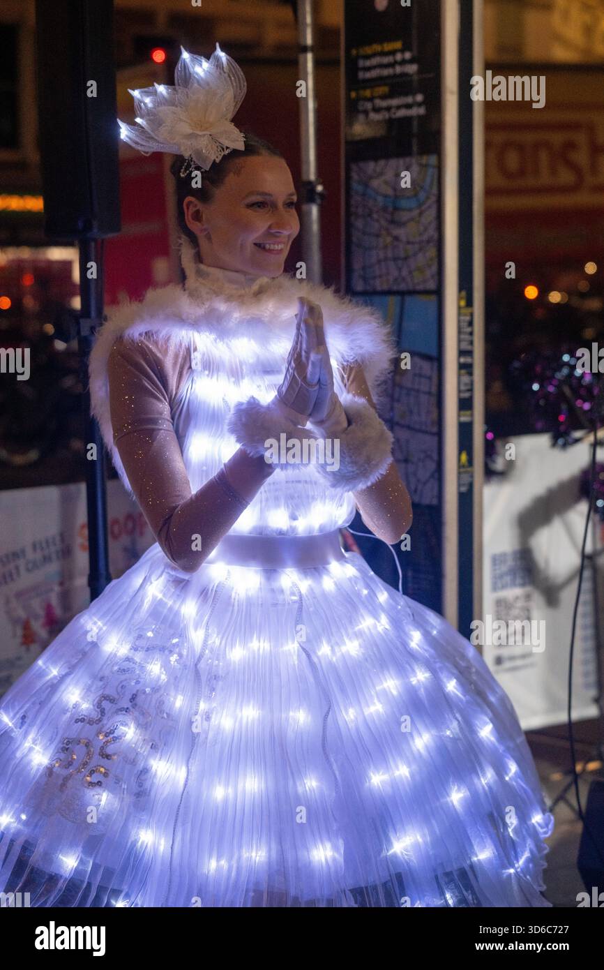 London, UK, 19th November 2025, Christmas Lights were switched on in Fleet Street by Alexander Armstrong, Snoopy and  Lady Lucy French on the 19th November. It marks the start of Festive Fleet Street Quarter 2025 programme which includes a Snoopy sculpture trail. Featuring 12 artist-designed Snoopy sculptures displayed across the Quarter, this runs until 16th January 2026., Andrew Lalchan Photography/Alamy Live News Stock Photo