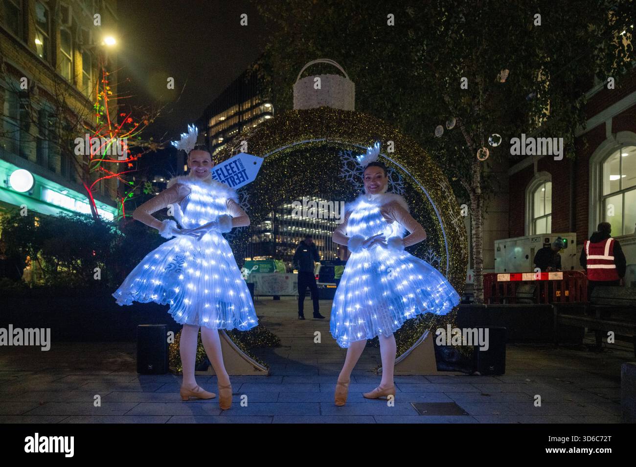 London, UK, 19th November 2025, Christmas Lights were switched on in Fleet Street by Alexander Armstrong, Snoopy and  Lady Lucy French on the 19th November. It marks the start of Festive Fleet Street Quarter 2025 programme which includes a Snoopy sculpture trail. Featuring 12 artist-designed Snoopy sculptures displayed across the Quarter, this runs until 16th January 2026., Andrew Lalchan Photography/Alamy Live News Stock Photo