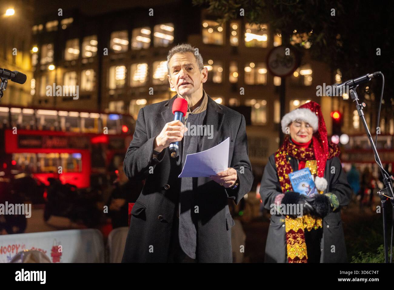 London, UK, 19th November 2025, Christmas Lights were switched on in Fleet Street by Alexander Armstrong, Snoopy and  Lady Lucy French on the 19th November. It marks the start of Festive Fleet Street Quarter 2025 programme which includes a Snoopy sculpture trail. Featuring 12 artist-designed Snoopy sculptures displayed across the Quarter, this runs until 16th January 2026., Andrew Lalchan Photography/Alamy Live News Stock Photo