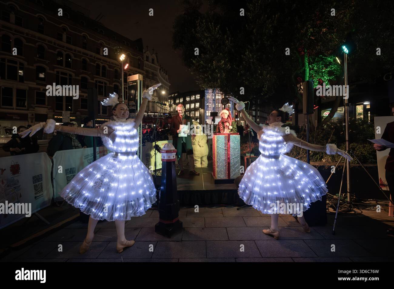 London, UK, 19th November 2025, Christmas Lights were switched on in Fleet Street by Alexander Armstrong, Snoopy and  Lady Lucy French on the 19th November. It marks the start of Festive Fleet Street Quarter 2025 programme which includes a Snoopy sculpture trail. Featuring 12 artist-designed Snoopy sculptures displayed across the Quarter, this runs until 16th January 2026., Andrew Lalchan Photography/Alamy Live News Stock Photo