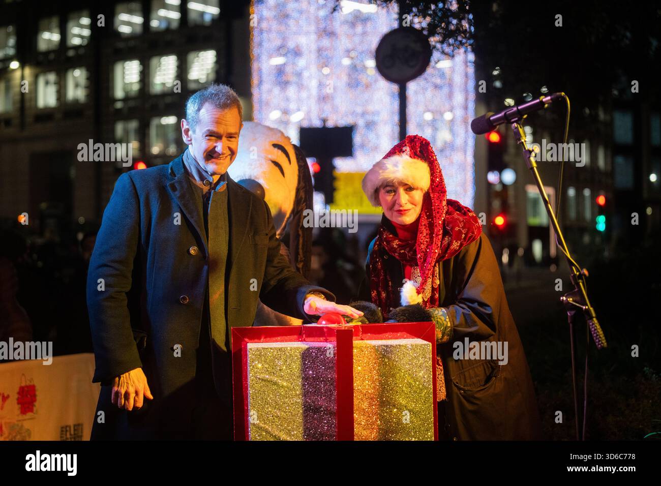 London, UK, 19th November 2025, Christmas Lights were switched on in Fleet Street by Alexander Armstrong, Snoopy and  Lady Lucy French on the 19th November. It marks the start of Festive Fleet Street Quarter 2025 programme which includes a Snoopy sculpture trail. Featuring 12 artist-designed Snoopy sculptures displayed across the Quarter, this runs until 16th January 2026., Andrew Lalchan Photography/Alamy Live News Stock Photo