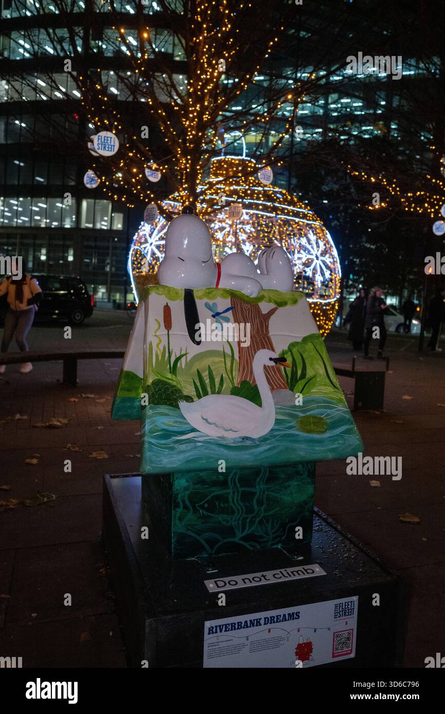 London, UK, 19th November 2025, Christmas Lights were switched on in Fleet Street by Alexander Armstrong, Snoopy and  Lady Lucy French on the 19th November. It marks the start of Festive Fleet Street Quarter 2025 programme which includes a Snoopy sculpture trail. Featuring 12 artist-designed Snoopy sculptures displayed across the Quarter, this runs until 16th January 2026., Andrew Lalchan Photography/Alamy Live News Stock Photo