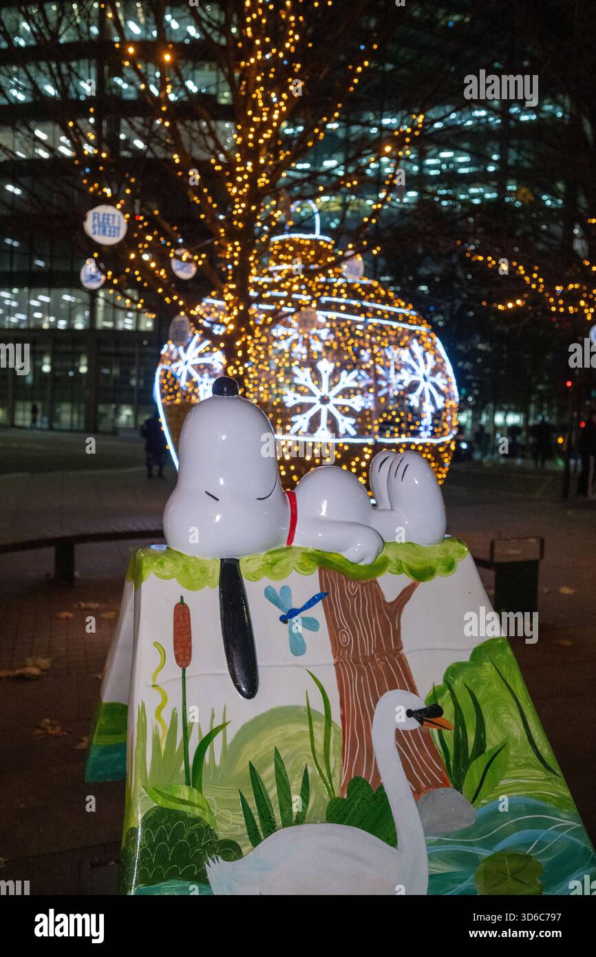 London, UK, 19th November 2025, Christmas Lights were switched on in Fleet Street by Alexander Armstrong, Snoopy and  Lady Lucy French on the 19th November. It marks the start of Festive Fleet Street Quarter 2025 programme which includes a Snoopy sculpture trail. Featuring 12 artist-designed Snoopy sculptures displayed across the Quarter, this runs until 16th January 2026., Andrew Lalchan Photography/Alamy Live News Stock Photo