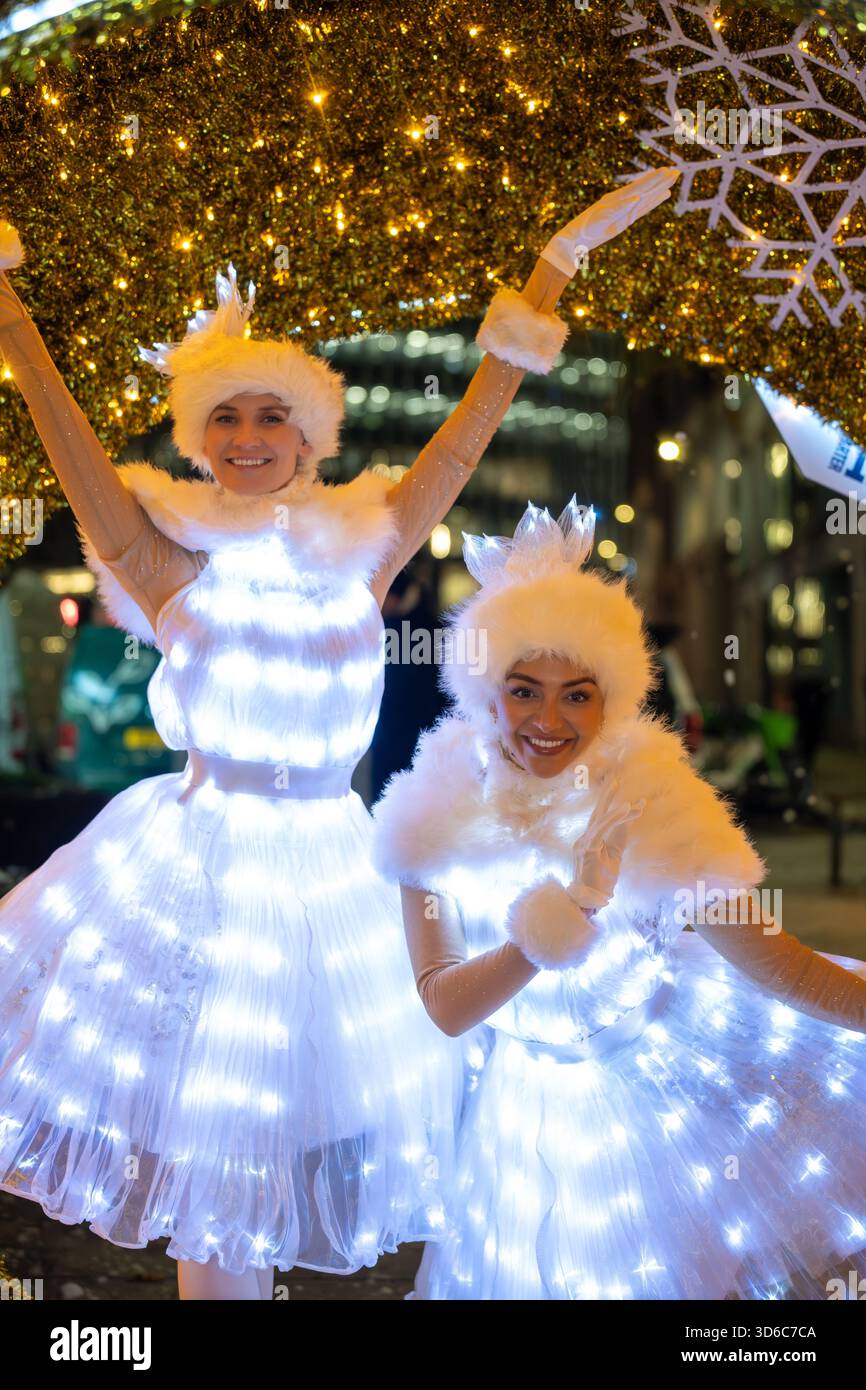 London, UK, 19th November 2025, Christmas Lights were switched on in Fleet Street by Alexander Armstrong, Snoopy and  Lady Lucy French on the 19th November. It marks the start of Festive Fleet Street Quarter 2025 programme which includes a Snoopy sculpture trail. Featuring 12 artist-designed Snoopy sculptures displayed across the Quarter, this runs until 16th January 2026., Andrew Lalchan Photography/Alamy Live News Stock Photo