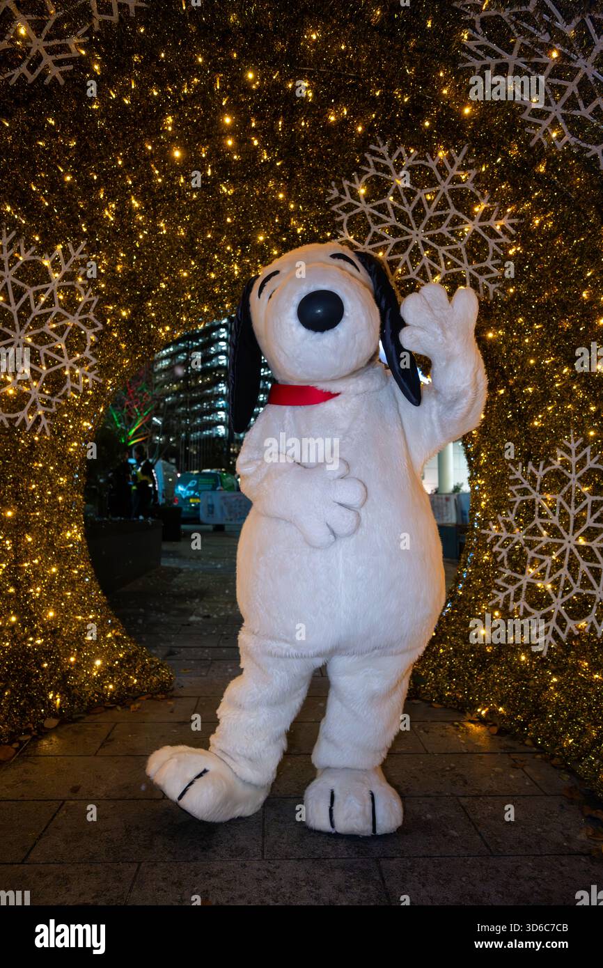 London, UK, 19th November 2025, Christmas Lights were switched on in Fleet Street by Alexander Armstrong, Snoopy and  Lady Lucy French on the 19th November. It marks the start of Festive Fleet Street Quarter 2025 programme which includes a Snoopy sculpture trail. Featuring 12 artist-designed Snoopy sculptures displayed across the Quarter, this runs until 16th January 2026., Andrew Lalchan Photography/Alamy Live News Stock Photo