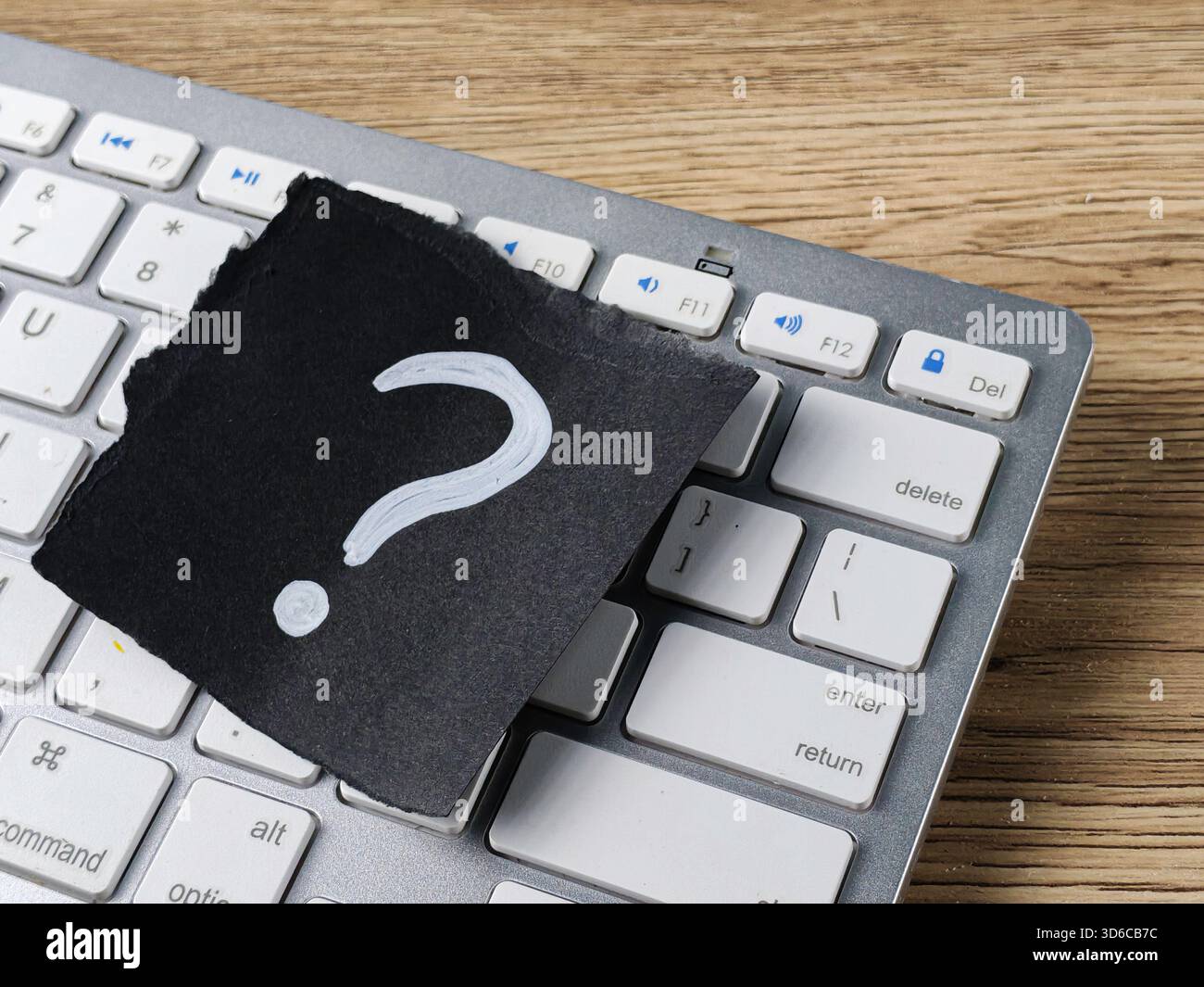 Technical Support Question Concept with Question Mark on Computer Keyboard for Online Help and Troubleshooting Stock Photo