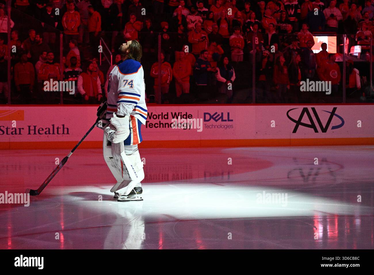 Edmonton Oilers goaltender Stuart Skinner stands on the ice before an ...