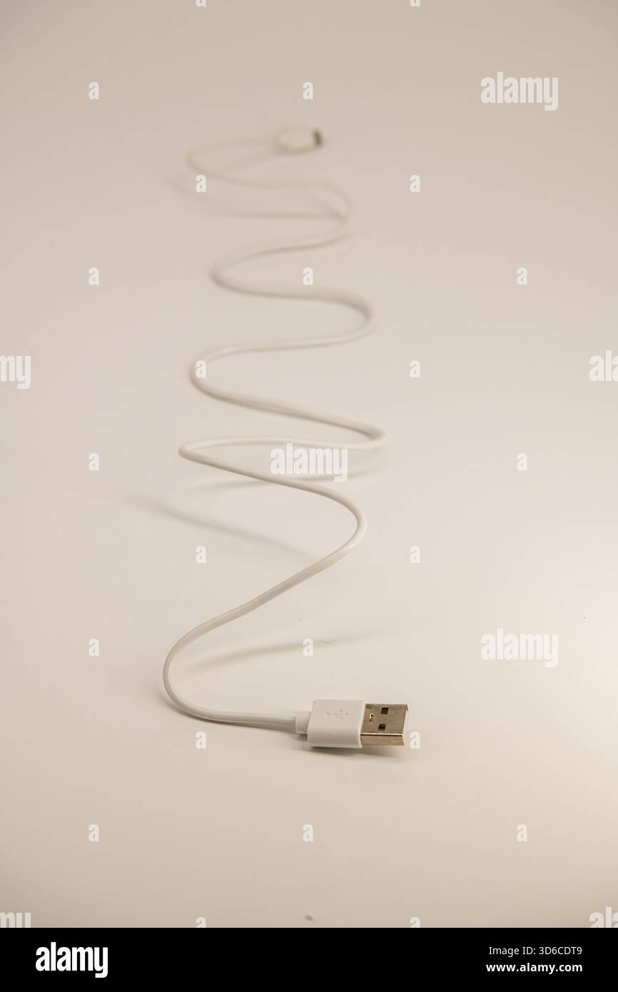 Cable with micro USB and USB connectors on a white background with clipping path. Stock Photo
