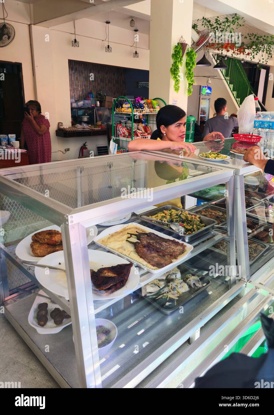A roadside restaurant selling Filipino dishes including Tortang Talong and stir fried ampalaya ( Bitter Melon ) in Luzon, Philippines. - Smartphone Captured Stock Image