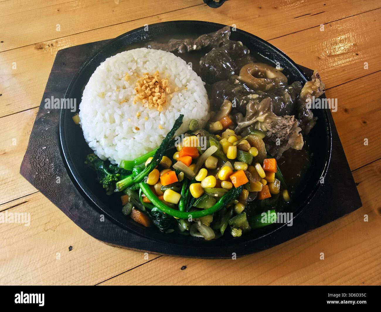 Beef and rice sizzle dish. - Smartphone Captured Stock Image