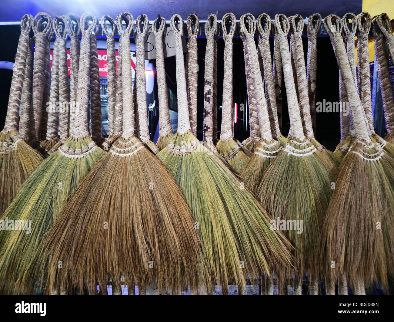 Traditional Filipino Grass brooms known as Walis Tambo. Photo taken in northern Luzon, Philippines. - Smartphone Captured Stock Image