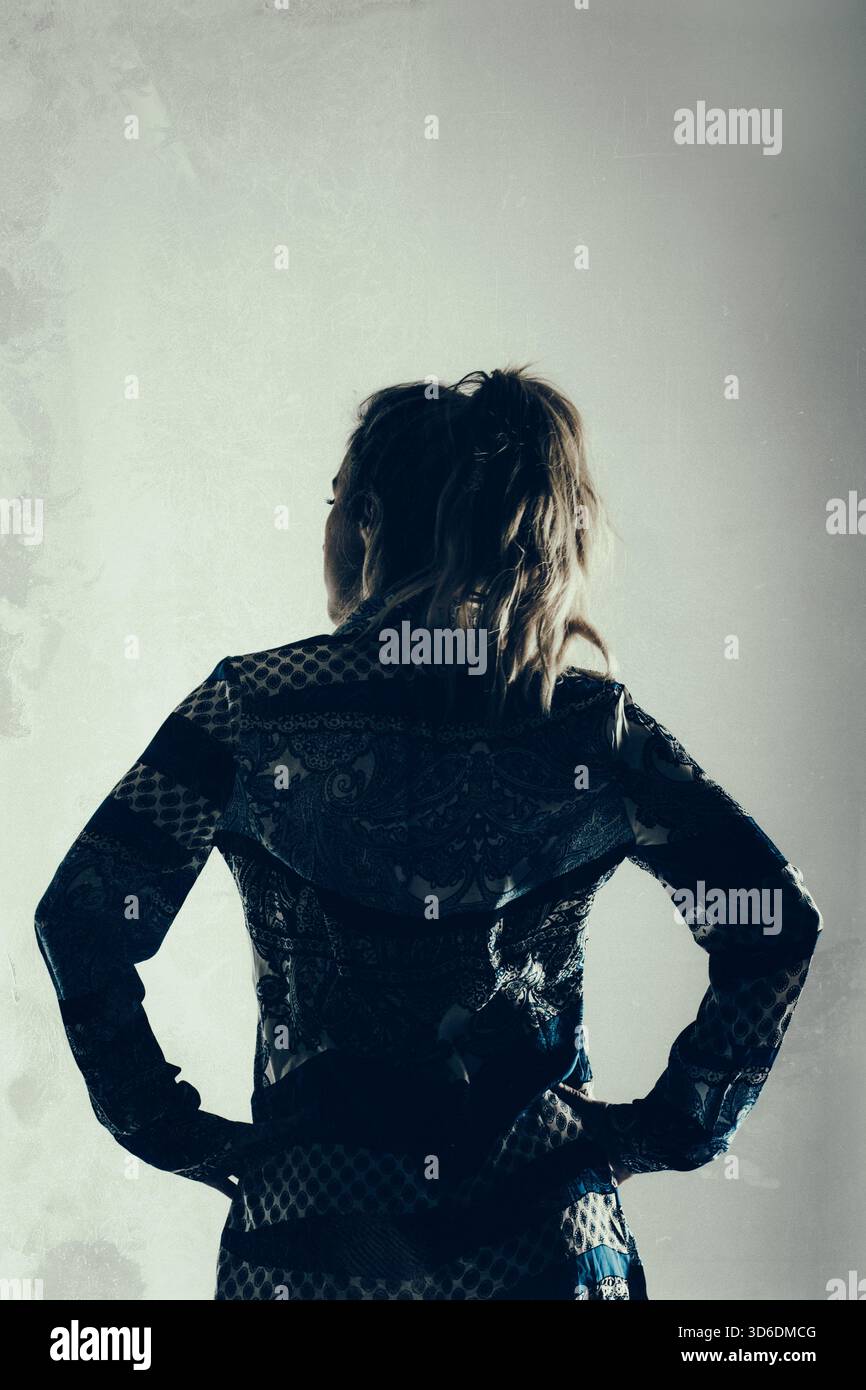 Rear view blonde woman Stock Photo - Alamy