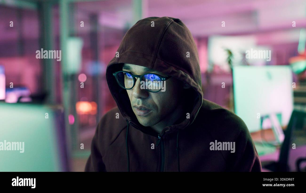 Night, hacker or man with computer for encryption breach, firewall attack or cybersecurity crisis. Confidential info, system access or programmer in Stock Photo