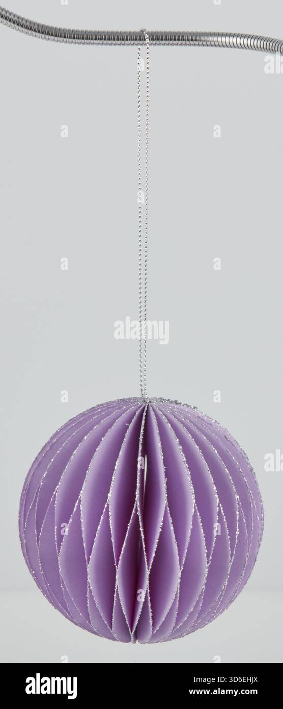 Christmas paper ball with hanging string Stock Photo