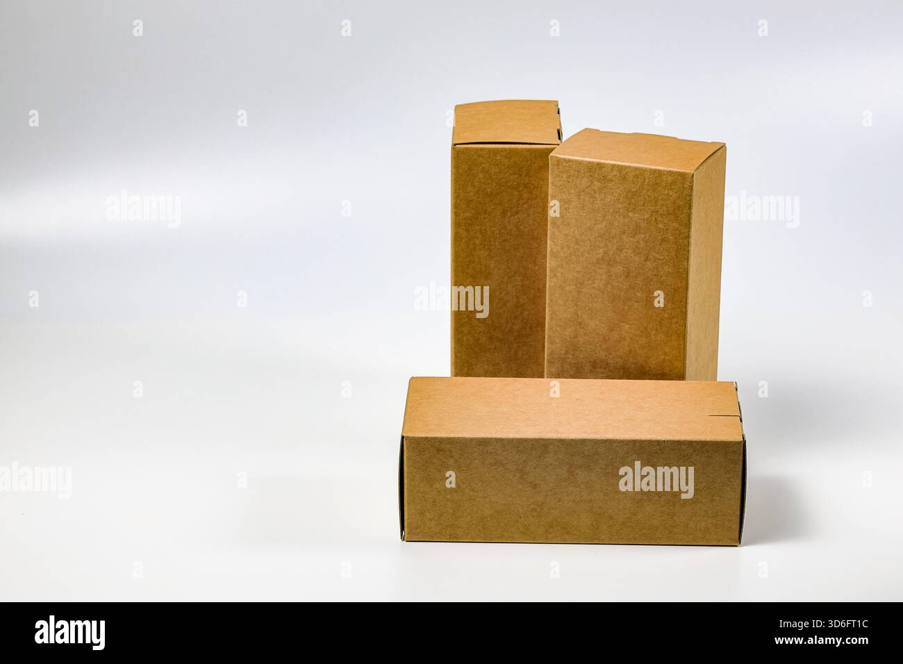 Several many rectangles Cardboard boxes for Parcel Delivery isolated on white background. Stock Photo