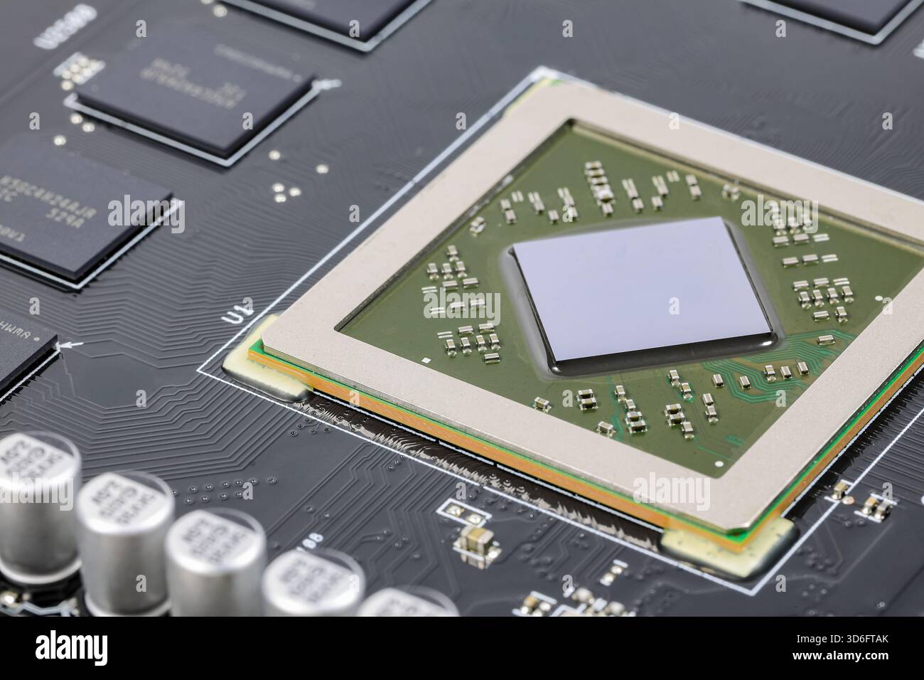 Close up modern printed circuit Board with Advanced Graphic Processing Unit.  Electronic Devices Production. Stock Photo